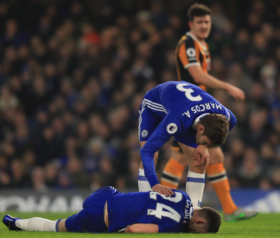  Gary Cahill also received treatment following the clash of heads