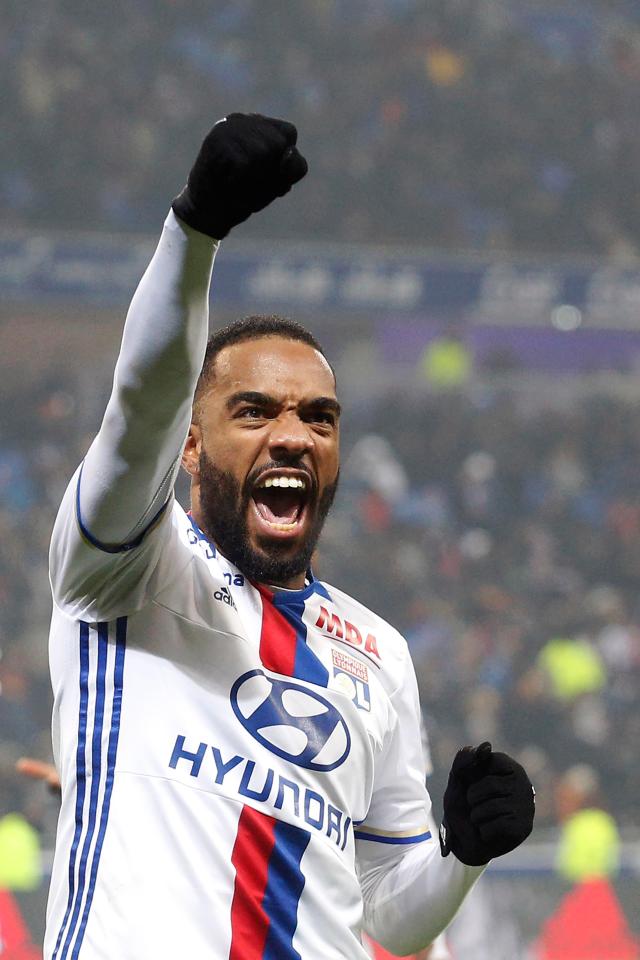  Lyon's Alexandre Lacazette celebrates after he scored a goal against Marseille