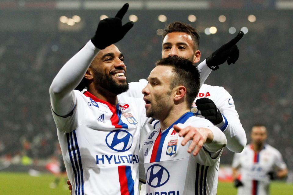  Alexandre Lacazette and Mathieu Valbuena celebrate after scoring for Olympique Lyon