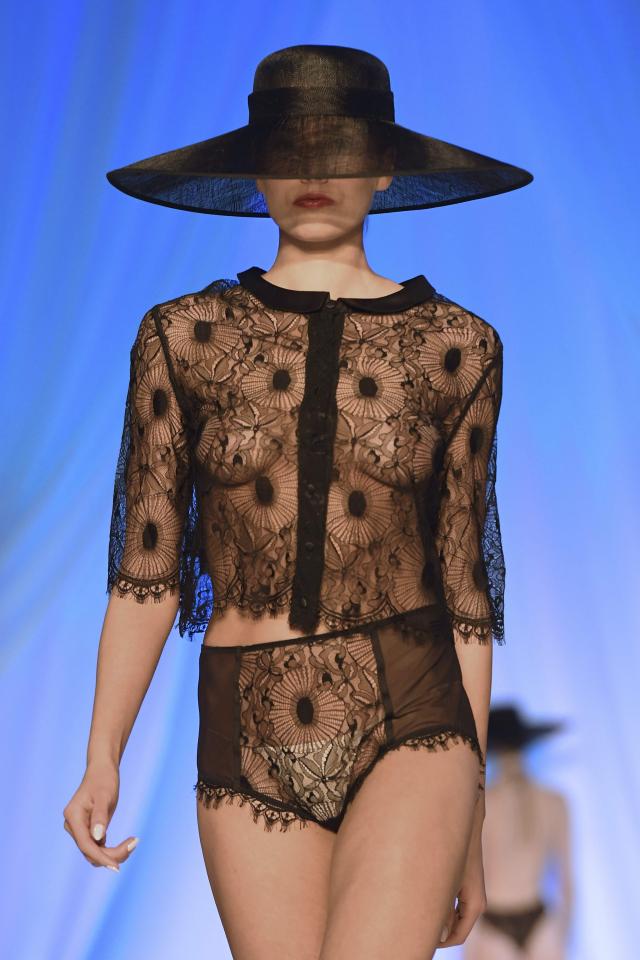  Models accessorised the lingerie looks with wide-brimmed black hats