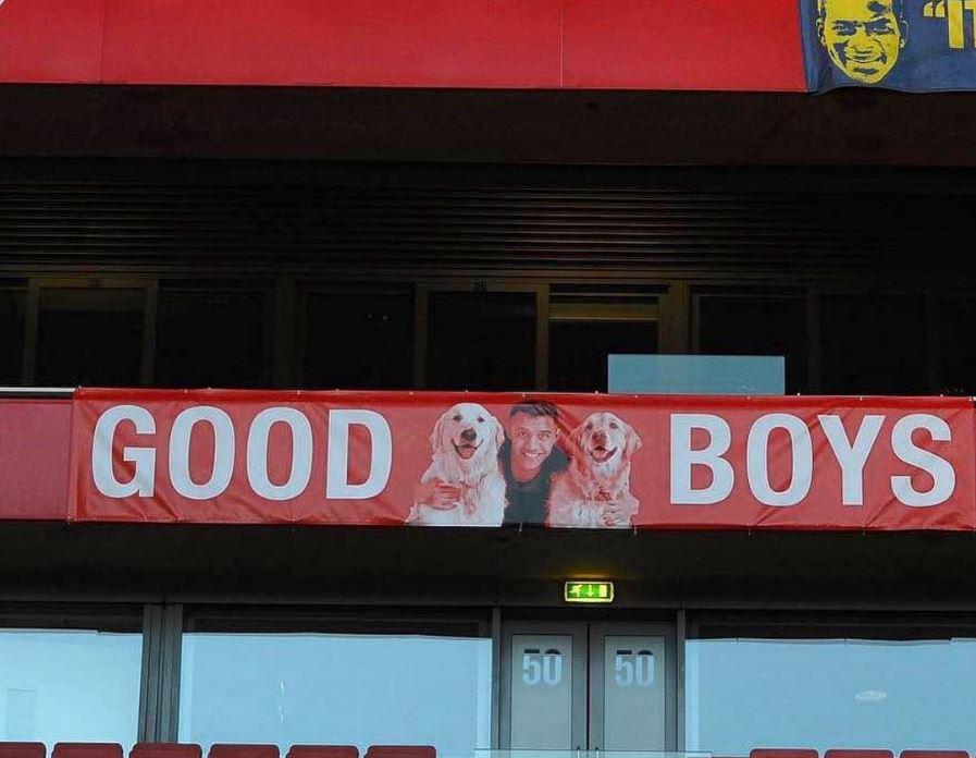  Alexis' affection for the pup pair is so well known that Arsenal fan group REDaction Gooners have created a banner which includes Sanchez and his two pets