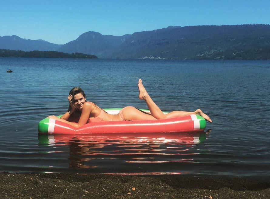  Mayte Rodriguez chills out on an inflatable dingy