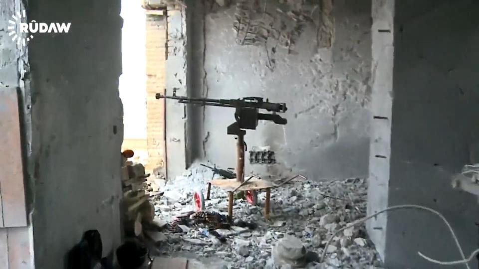  An ISIS machine gun post is left abandoned after the jihadis flee