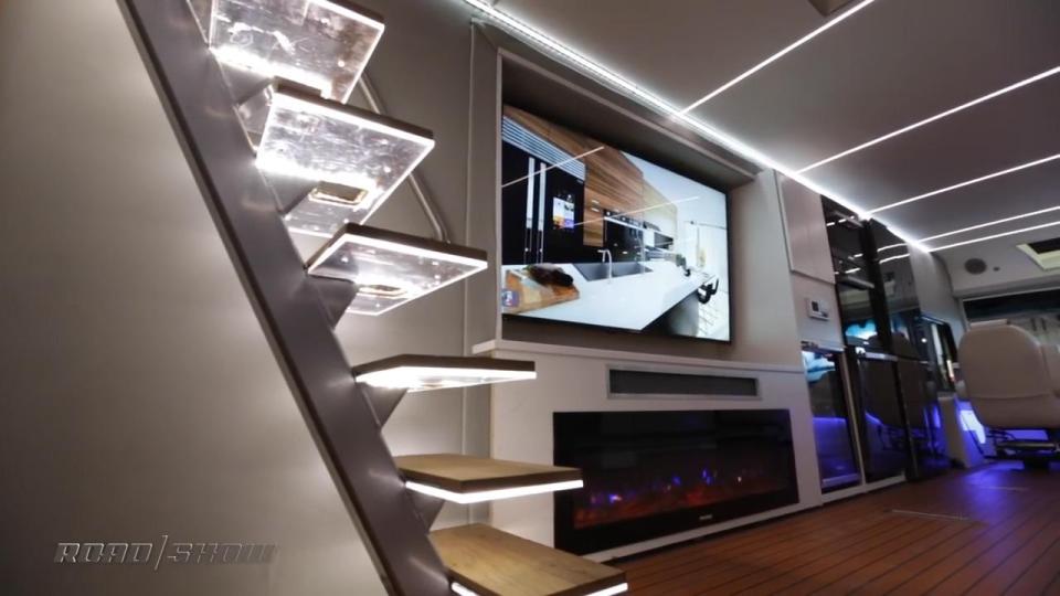  The roof can be accessed by a staircase inside the glamorous RV