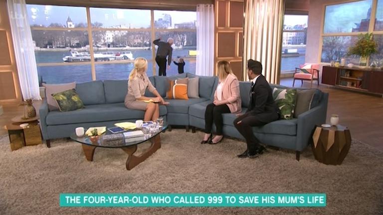  Holly carried on the interview as Phil and Jacob went to the window