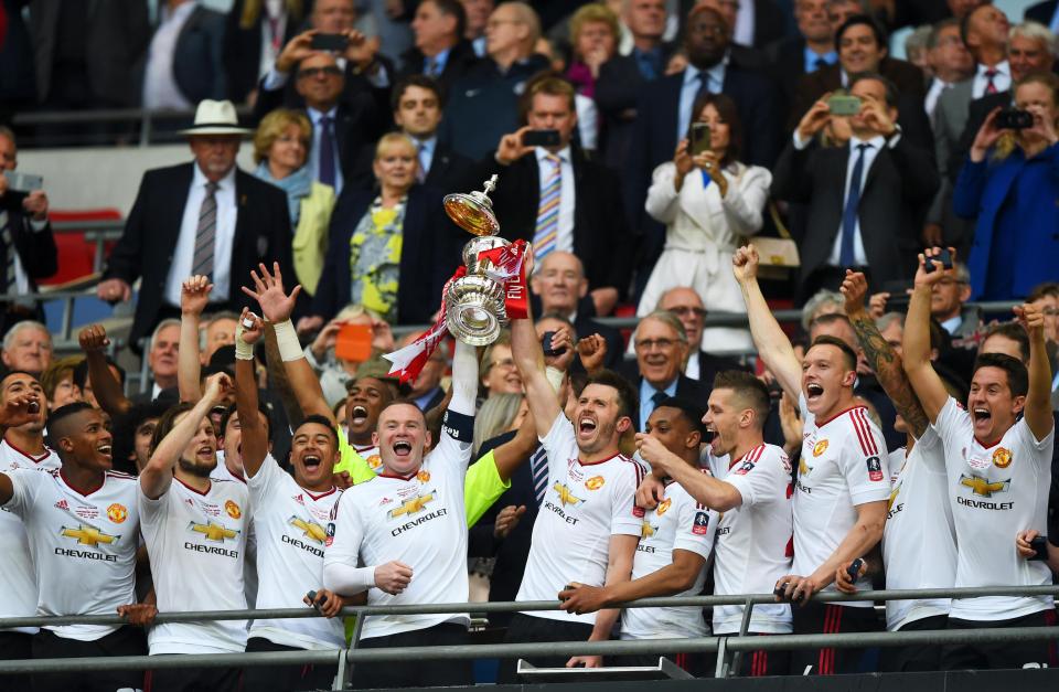  Manchester United celebrate winning last season's FA Cup