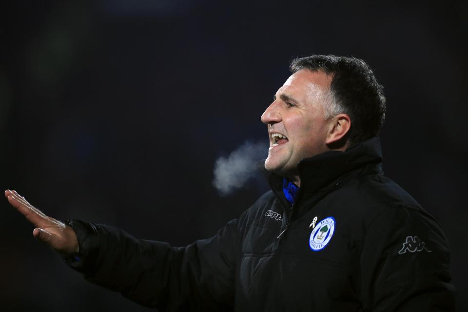  Warren Joyce takes his Wigan team to Old Trafford tomorrow