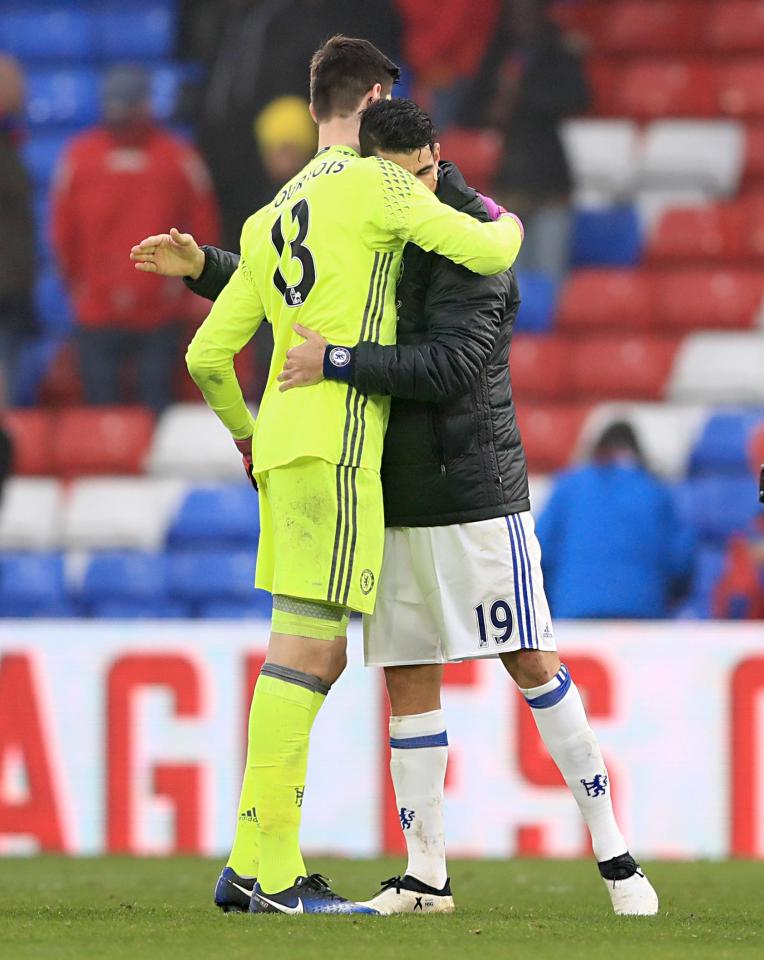  Diego Costa and Thibaut Courtois embrace after Chelsea's win at Crystal Palace