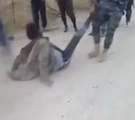  Another video shows troops dragging jihadis through the streets of Mosul before executing them