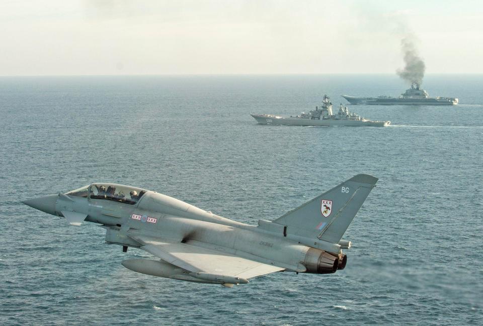  A Royal Air Force Typhoon shadowing Russian Warships Petr Velikiy (centre) and the Admiral Kuznetsov (background) in the North Sea