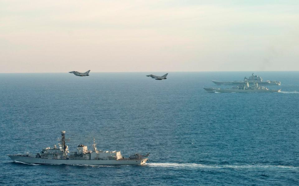  The Russian Warships Petr Velikiy (centre) and the Admiral Kuznetsov (background) as they transit near to our sovereign waters on their way back to Russia