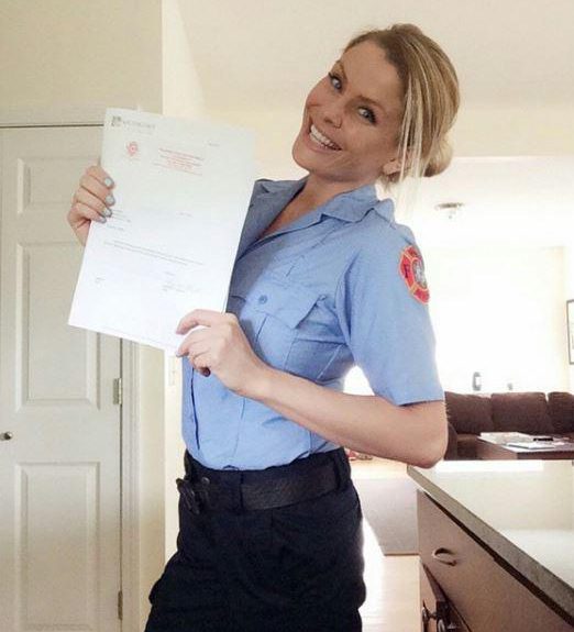  Paramedic Zoe smiles with her award after receiving a commendation for saving a life