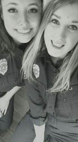  Two best friends pose for a selfie during their fire prevention training for the service