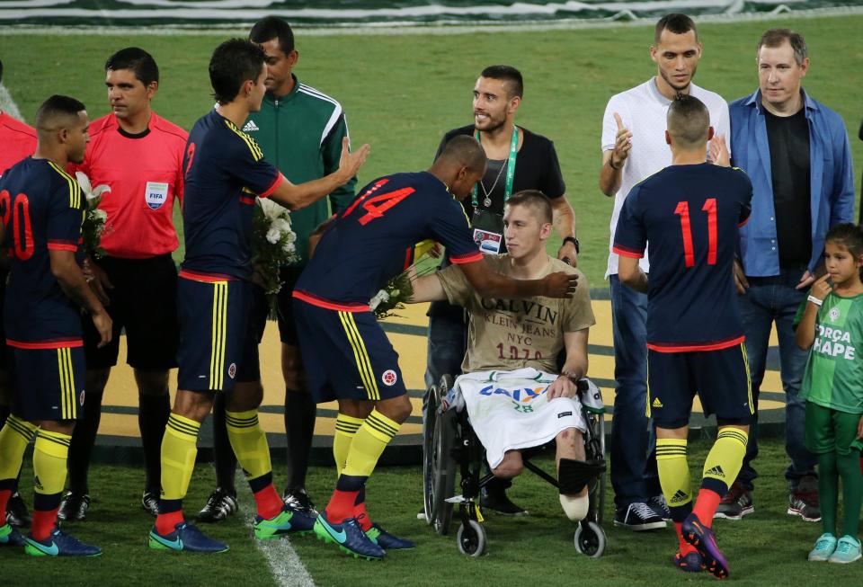  Follmann is introduced to the Colombia team before the friendly