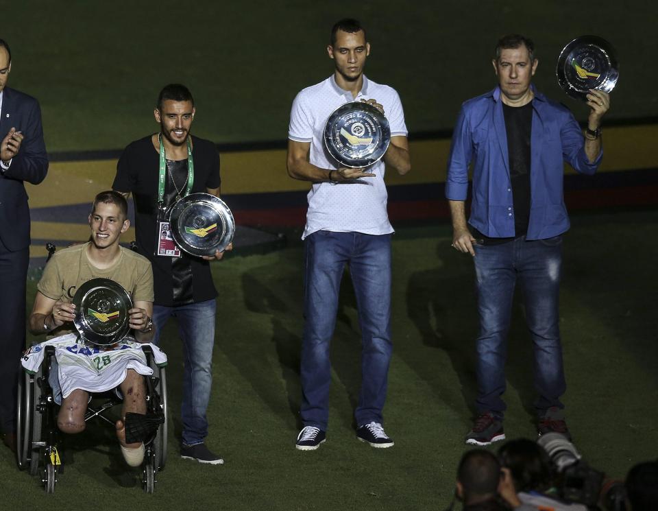  Survivors of the Chapecoense plane accident participate in a ceremony in honour of the victims