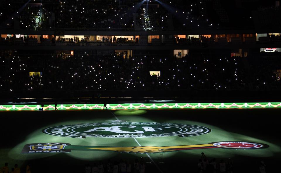  The club's badge was illuminated against a dark field before the start of the match in a touching tribute