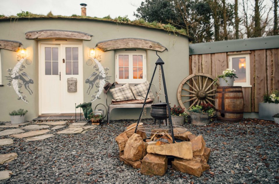  A fire pit stands outside the unique holiday hideaway on the Cornish coast