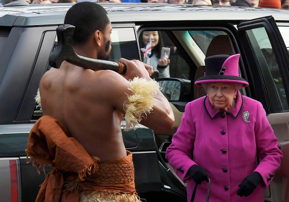  Wearing just a skirt made from dried bark strands one of her guards stands 6ft 4ins tall, weighs 17 stone and was an imposing figure