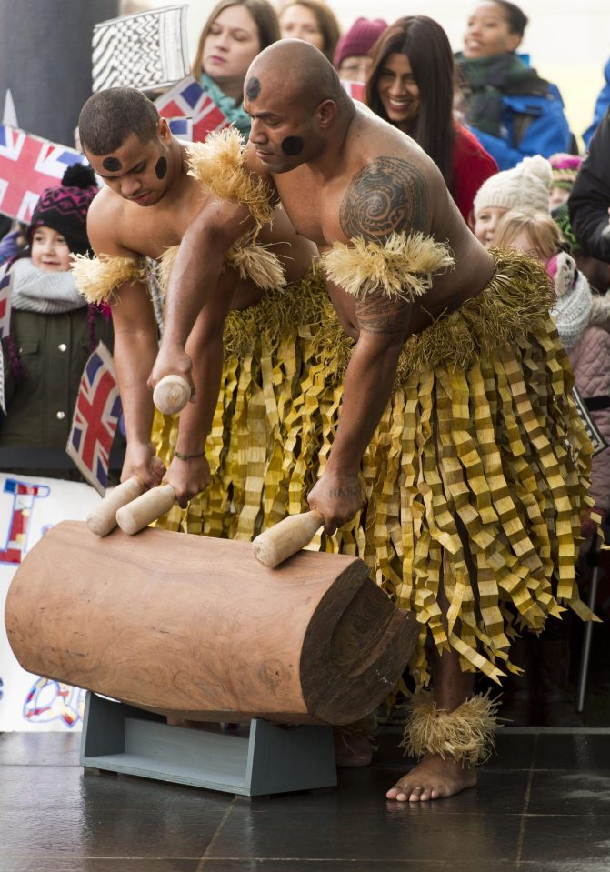  She was welcomed with traditional music as she walked into the exhibition