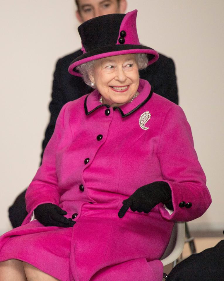  Her Majesty looked to be having a good day as she took in the exhibition at the University of East Anglia