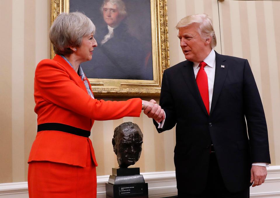  Theresa May and Donald Trump wore matching shades of red for their first meeting in Washington