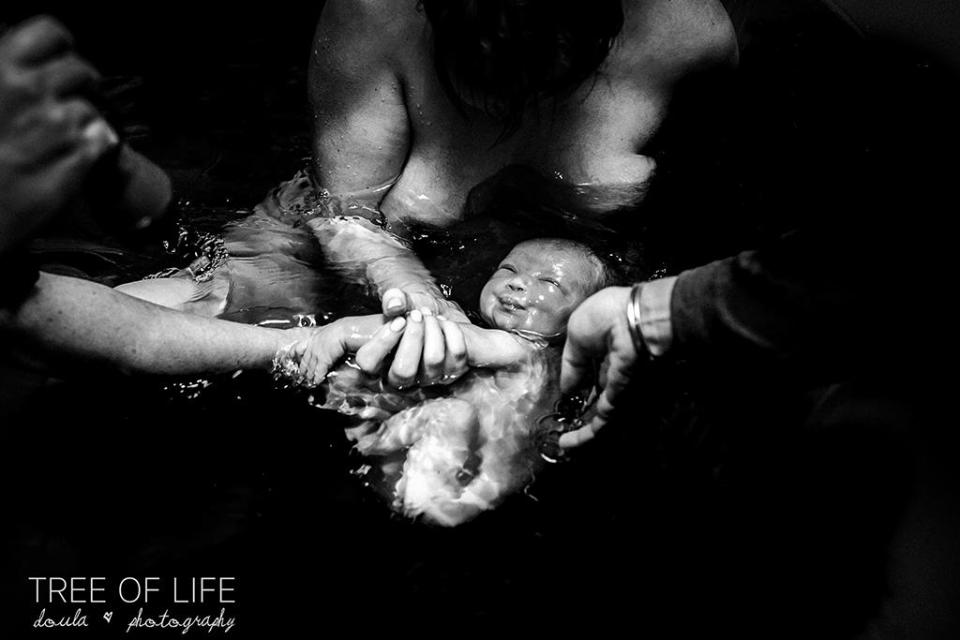  As she rose from the depths into the hands of love, by Tree of Life Doula Photography