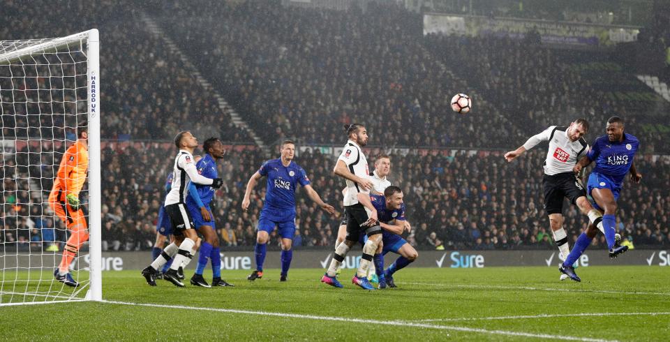  Wes Morgan rises to score a bullet header and earn his side a replay on home soil