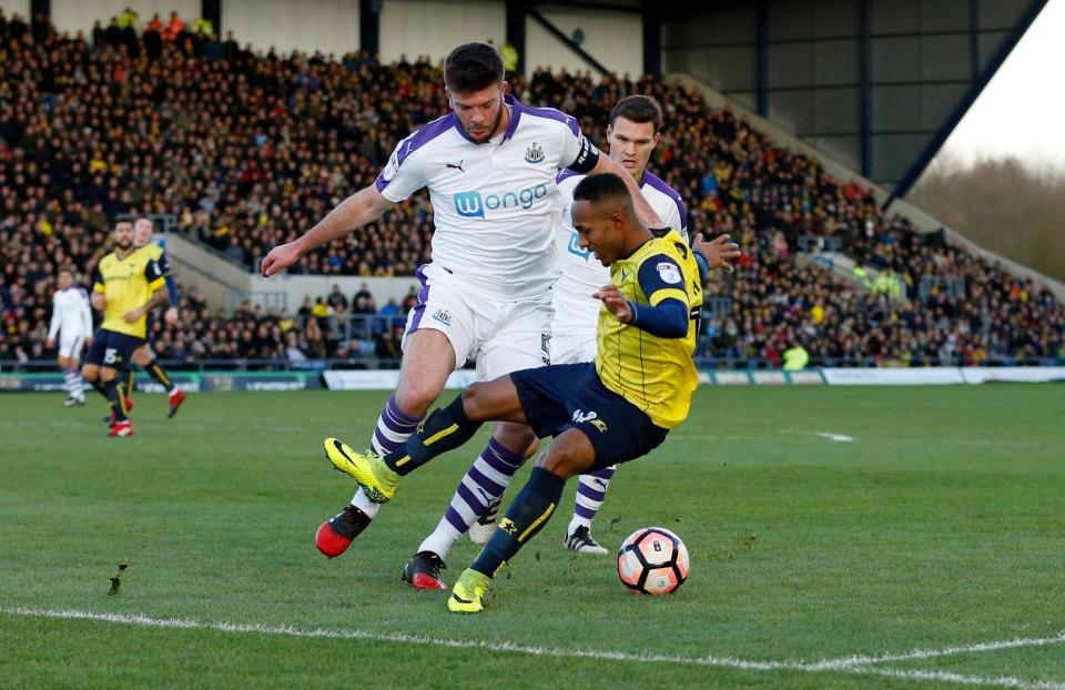  wcastle United's Grant Hanley in action with Oxford United's Rob Hall