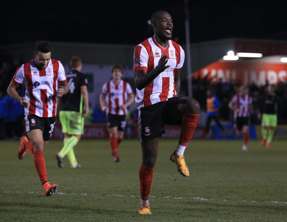  Theo Robinson enjoys bagging the third goal as Lincoln came from behind to KO Brighton 3-1