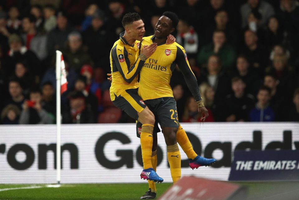  Kieran Gibbs celebrated with the England striker after he opened the scoring