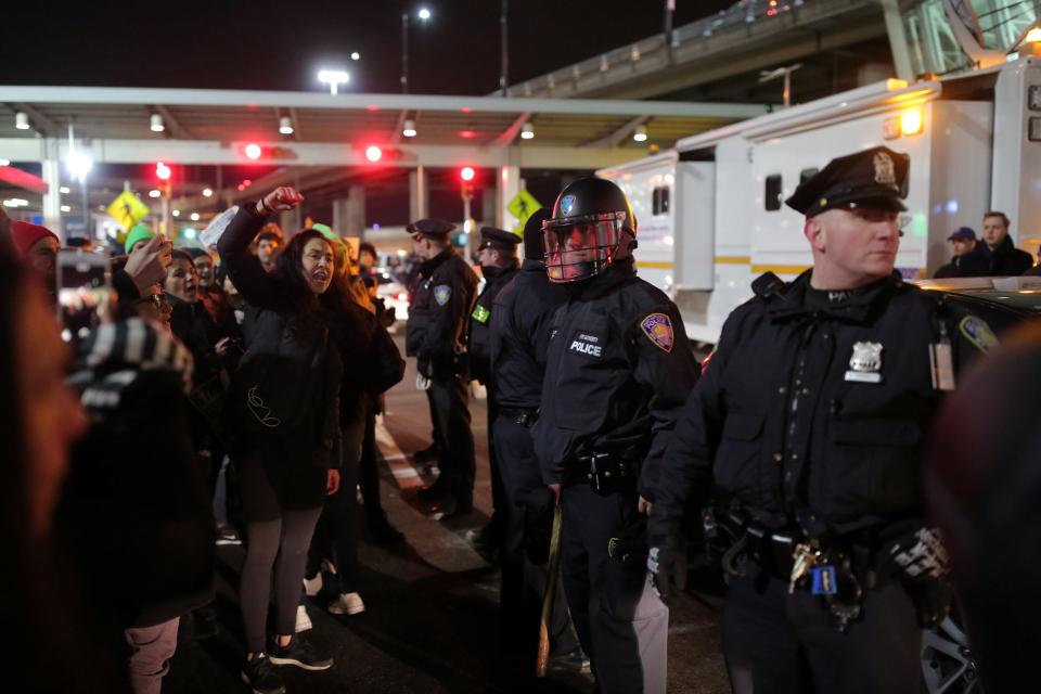  Protesters at JFK airport, where 12 refugees were said to be detained by officials