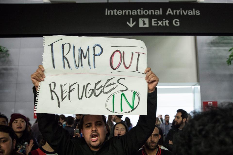  The ban has sparked widespread protests at airports across America