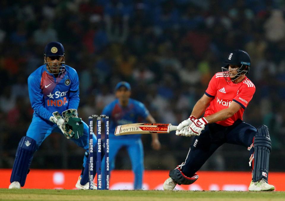  England's Joe Root plays a shot