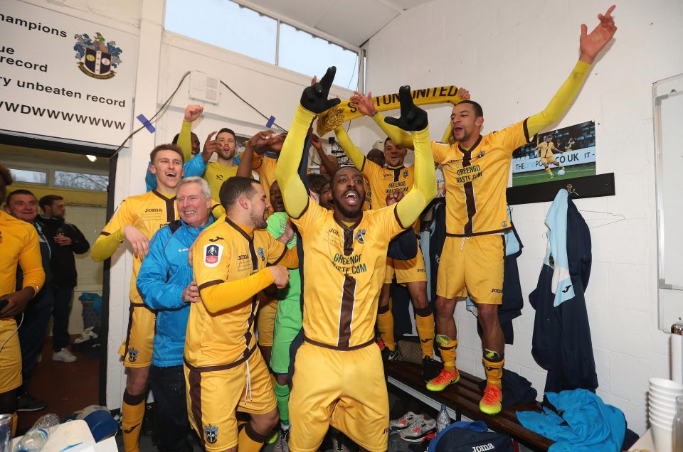  The Sutton United squad celebrate their historic FA Cup victory over Leeds United