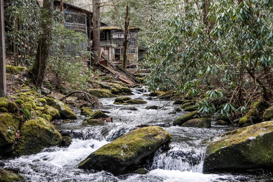  Some of the cabins are mostly intact, while others have collapsed into ruin