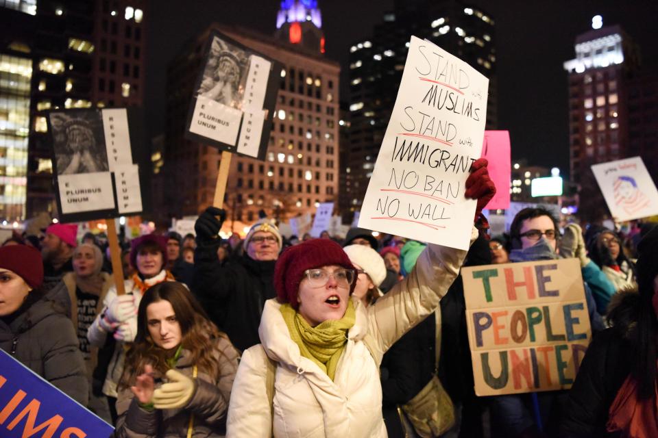  Protesters in the US and UK last night stood firm against Donald Trump