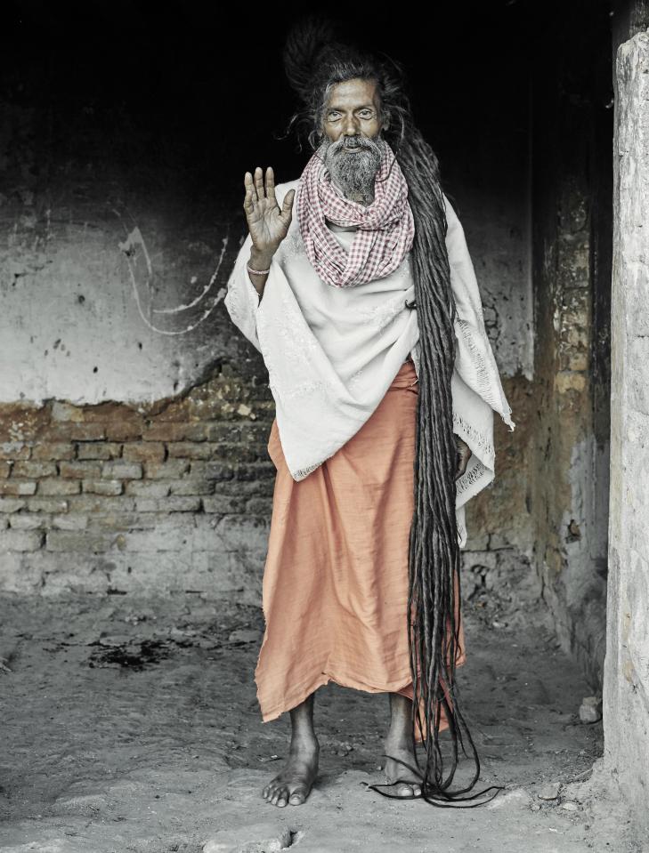  This man's dreadlocks are down to his feet