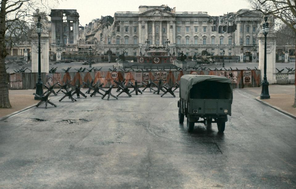  Buckingham Palace is shown crumbling and adorned with Swastikas in the dystopian alternate reality