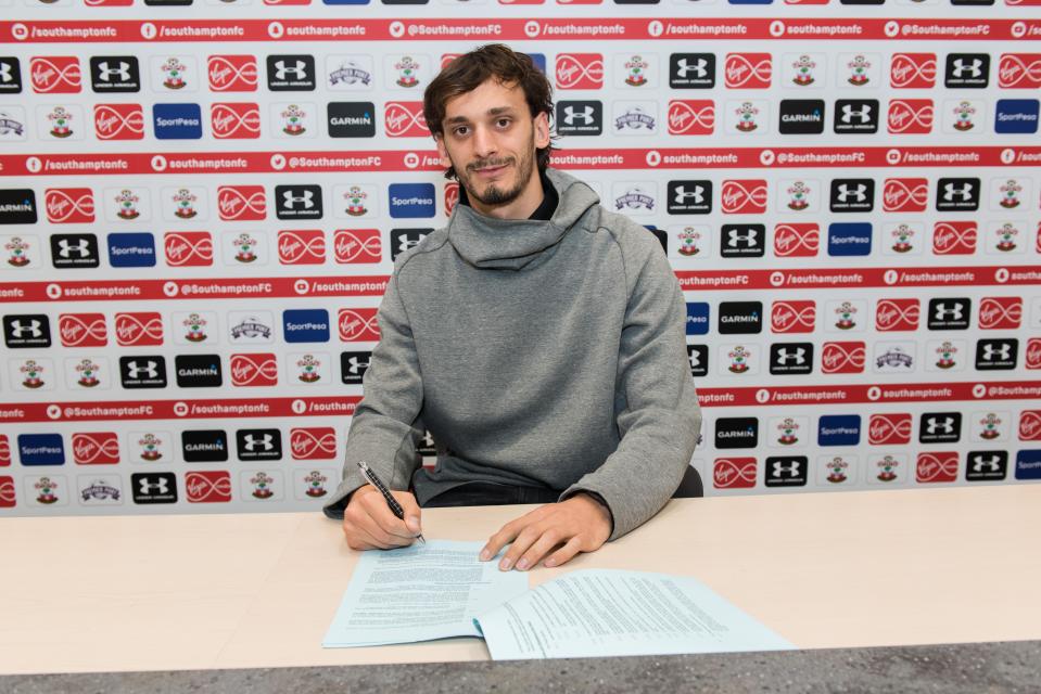  Gabbiadini while signing his four-and-a-half year deal at Saints