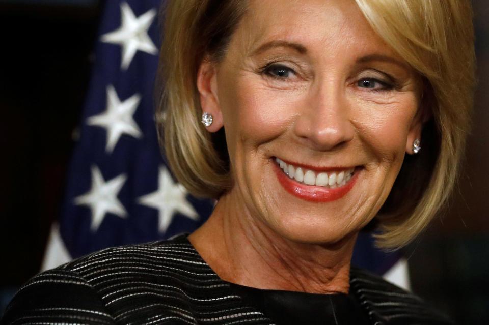  Betsy DeVos waits to be sworn-in as U.S. Education Secretary at the Eisenhower Executive Office Building at the White House in Washington