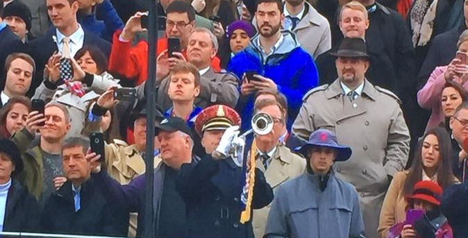  A viewer spotted this man in the crowd, noting: 'Spot the Russian spy blending in'