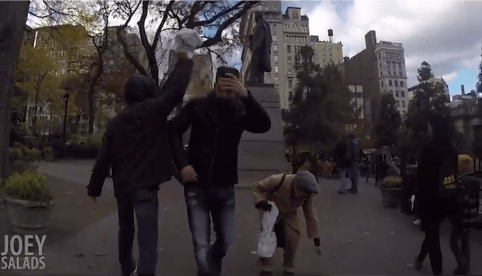 Joey Salads has his pro-Trump hat knocked off his head by a man in a park 