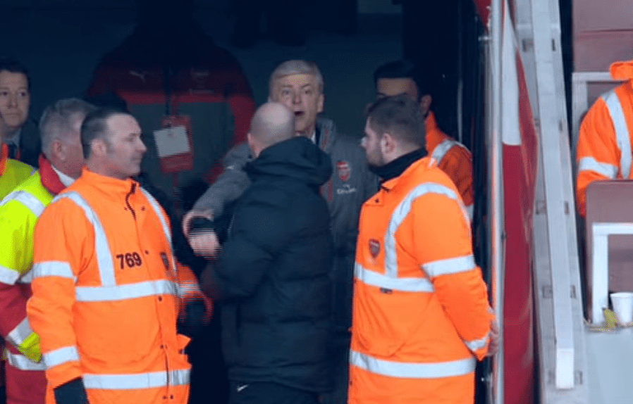  Arsene Wenger pushed fourth official Anthony Taylor after he is sent to the stands for arguing against referee Jon Moss' decision to award Burnley a 93rd-minute penalty at the Emirates