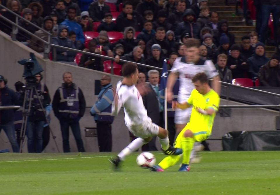  Dele Alli's tackle was high on Brecht Dejaegere's shin and gave the ref no option but to show him red