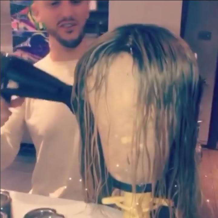  Katie filmed her hairdresser Ben as he gave her wig a blow dry