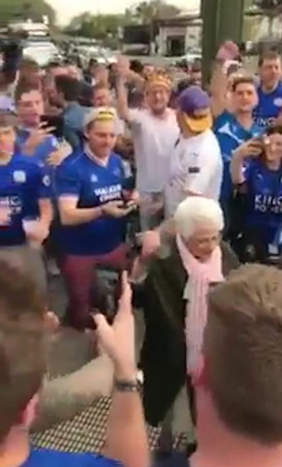  The lady was the centre of attention outside a bar where Leicester fans were gathered