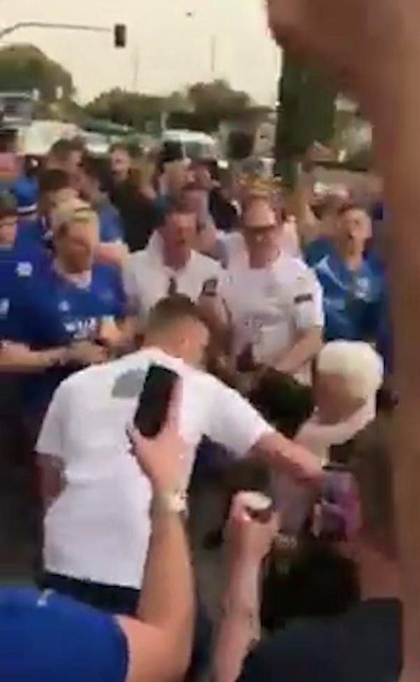  A Leicester supporter joins in the dancing show in Seville