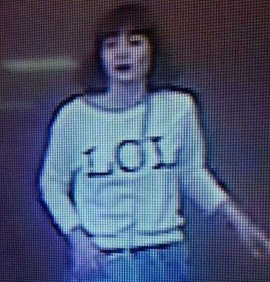  An image released of one of the female suspects shows her wearing a "LOL" top