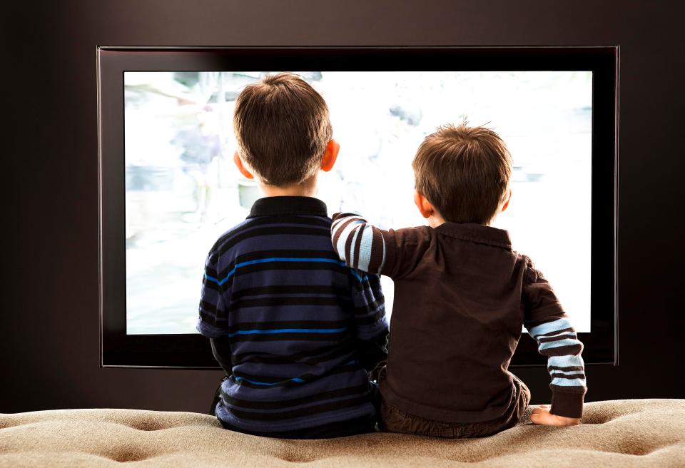  Kids who watched up to six hours of TV a day are not harming themselves, say experts