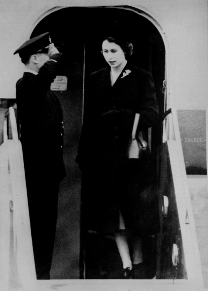  The new monarch leaves the plane alone on February 7, 1952